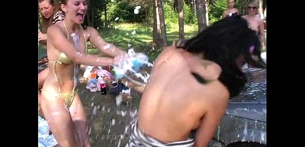  Topless college chicks erotically wash car at the picnic